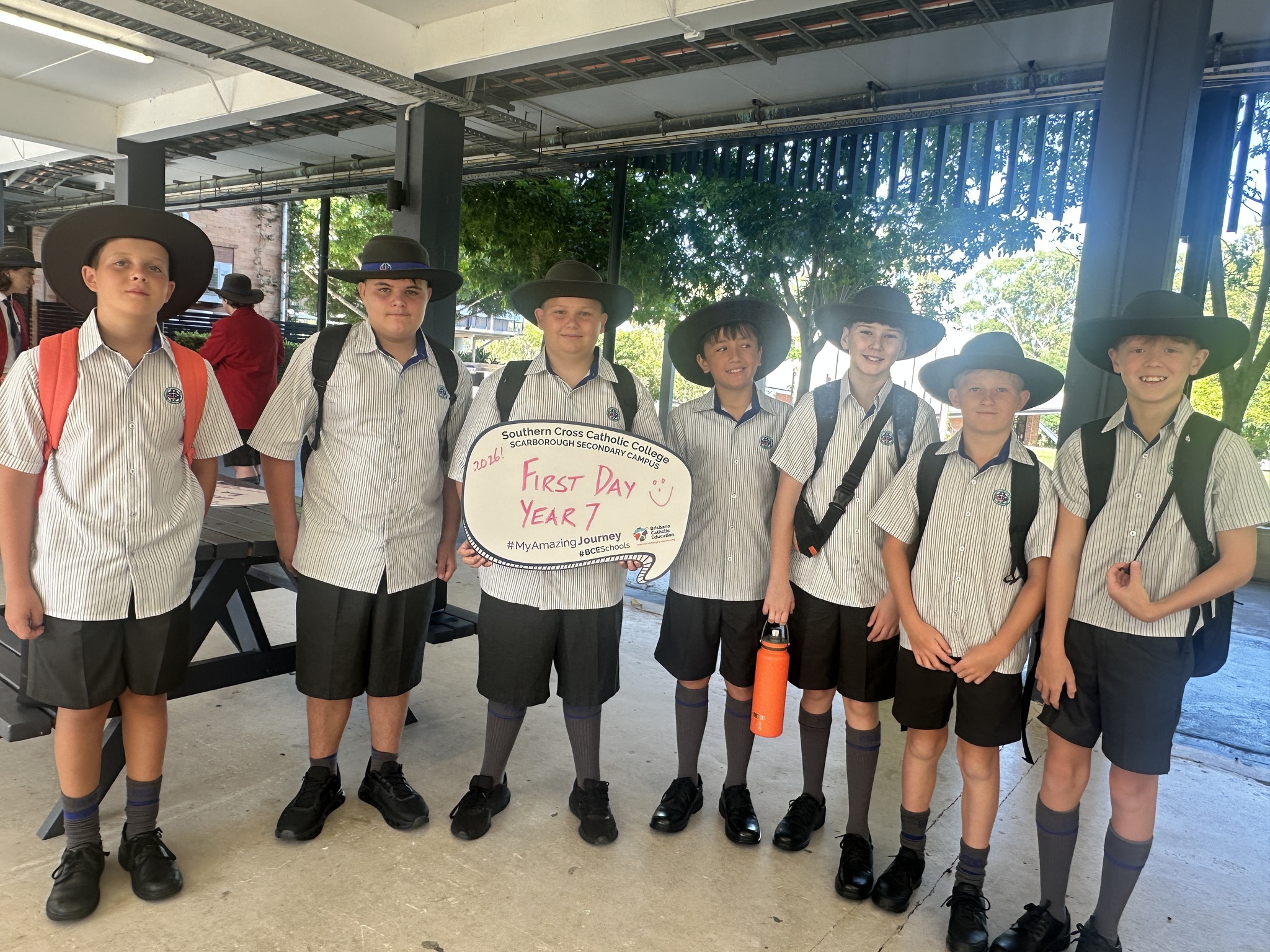 group of year 7 students holding a sign which says First Day of Year 7